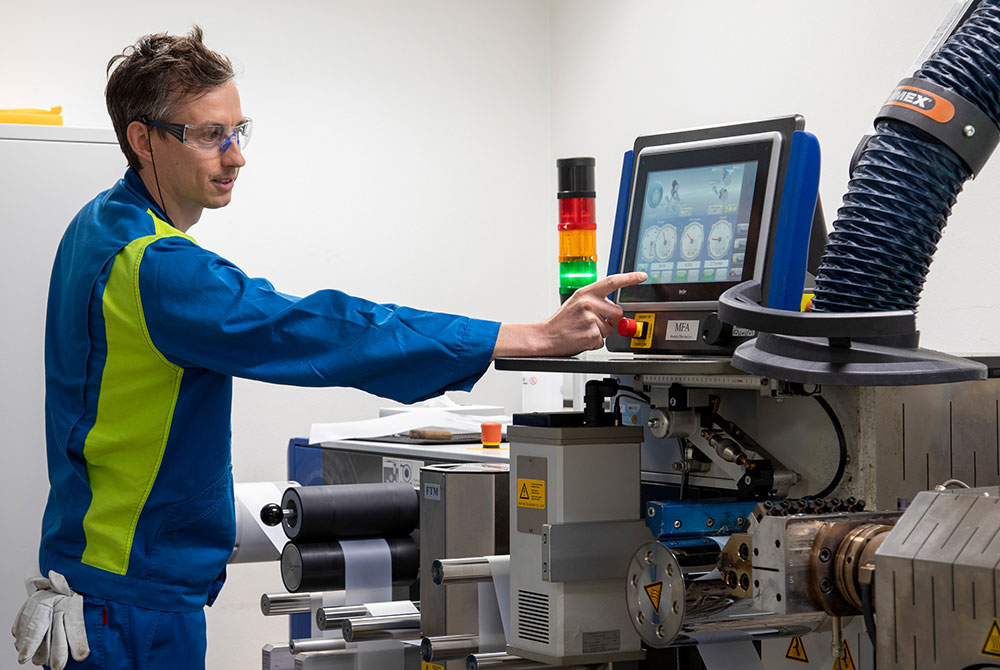 image of employee checking monitor