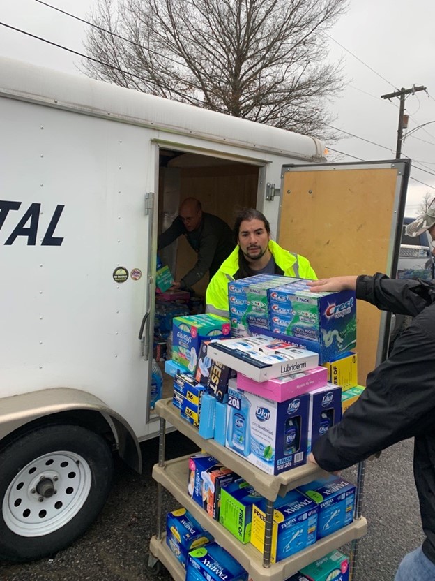 Volunteers donating consumer staples